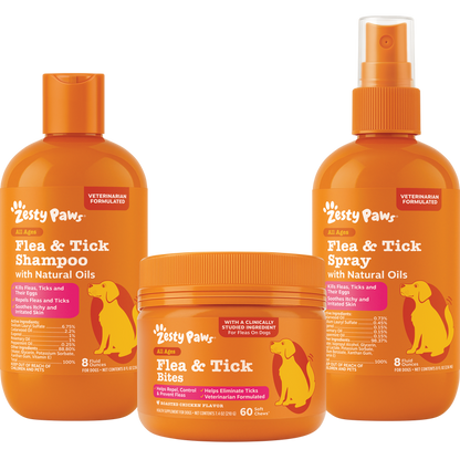 Three orange Zesty Paws flea and tick products: shampoo bottle, bite chews jar, and spray bottle.