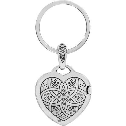 Brighton heart locket keychain with silver-plated engraved floral medallion design and split key ring on a white background