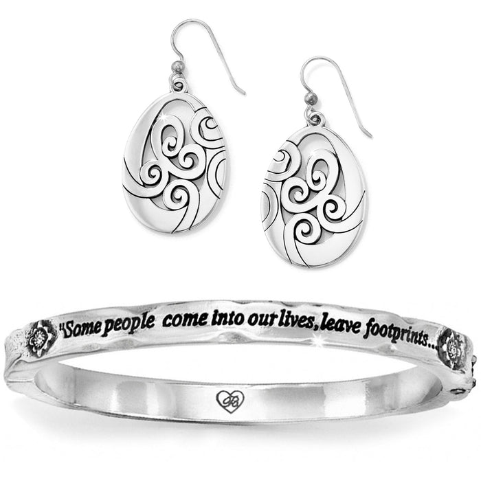 Brighton drop earrings with oval swirl design paired with engraved silver-tone inscribed bangle bracelet on a white background