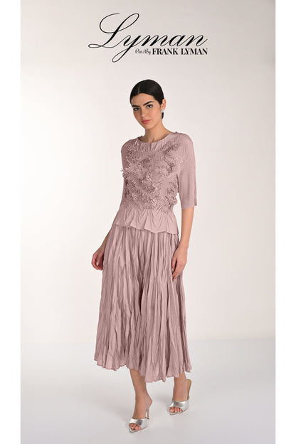 Model wearing Frank Lyman 268520 Dusty Rose Top and Skirt by Frank Lyman Shop Frank Lyman at Dotique