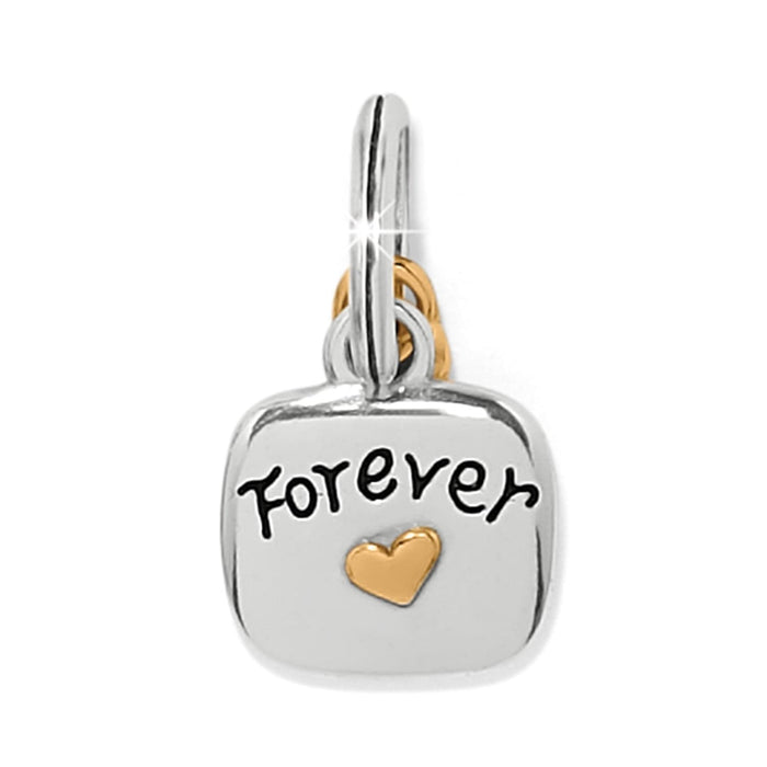 Brighton charm with silver-tone square engraved with forever and small gold-tone heart accent on a white background