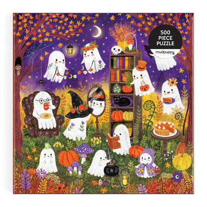 The Ghostly Gathering 500 Piece Puzzle by Jenny Miriam features charming ghosts celebrating Halloween amidst pumpkins and lanterns, making it an ideal choice for a fun family puzzle night.