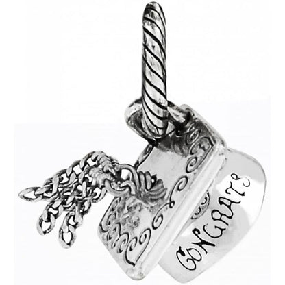 Brighton silver-plated charm shaped like a cake with candle and Congrats engraving on a white background