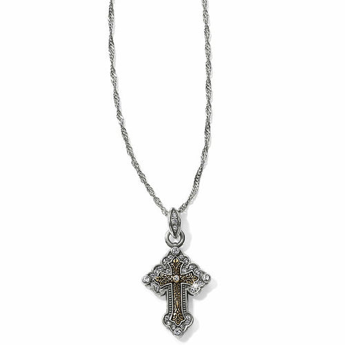 Brighton pendant necklace with two-tone cross featuring crystal accents and gold scrollwork on a white background