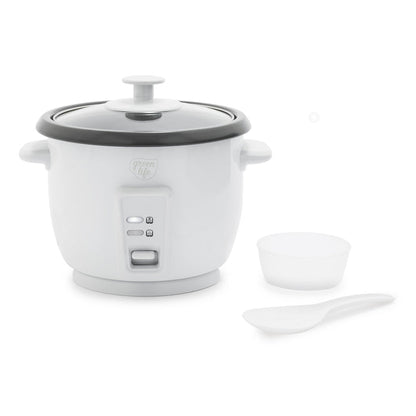 White rice cooker with glass lid, ceramic pot, measuring cup, and rice paddle shown together.