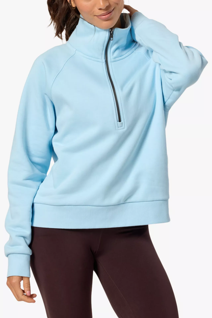 Woman wearing Gym+Coffee Clubhouse Quarter Zip in Baby Blue by Gym+Coffee, shop Gym+Coffee at Dotique for stylish activewear.