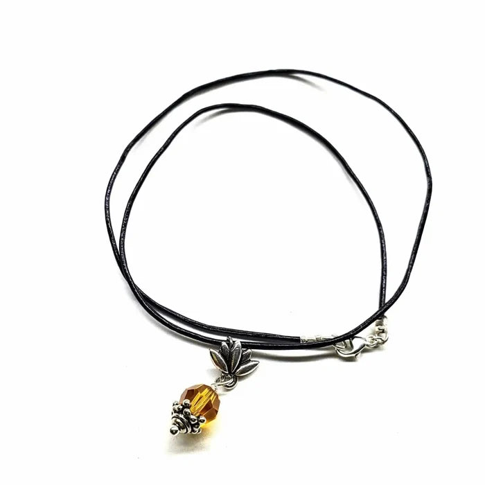 Handmade silver crystal pineapple leather necklace with sterling silver pineapple pendant and yellow Swarovski crystal.