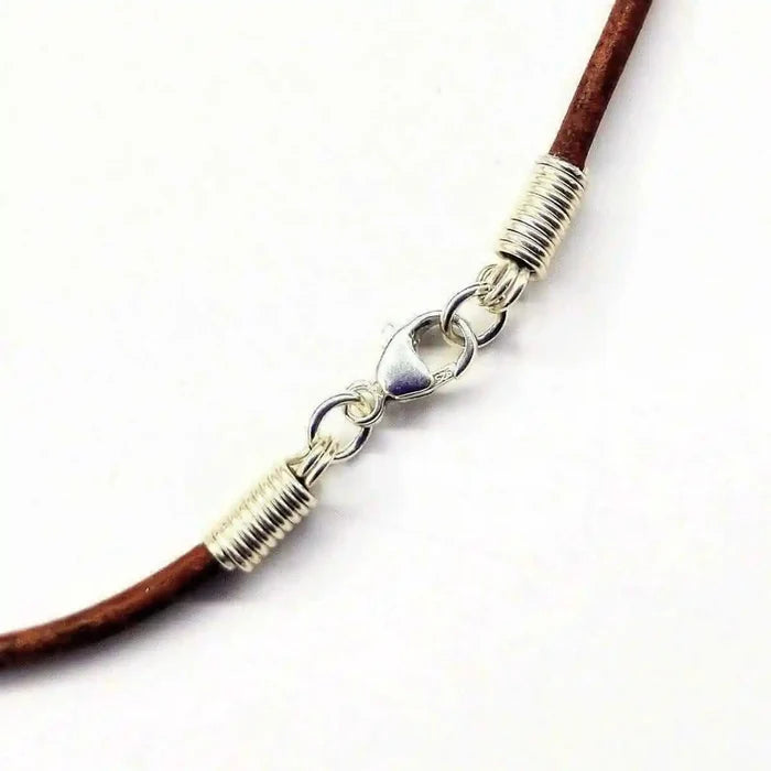 Handmade Silver Wire Wrapped Gemstone Crystal Point Pendant chain clasp detail with silver wire and brown leather.
