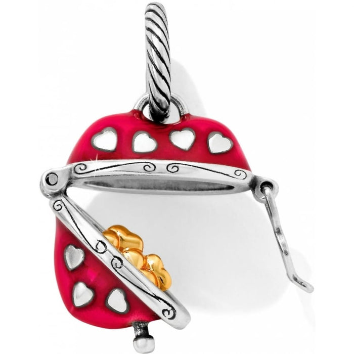 Brighton charm shown open with red enamel heart cutouts, silver-plated finish, and gold flower interior on a white background