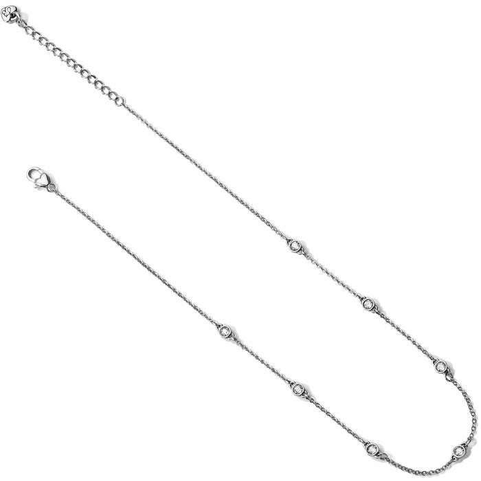 Brighton silver-tone station necklace with small crystal accents along delicate chain and lobster clasp on a white background