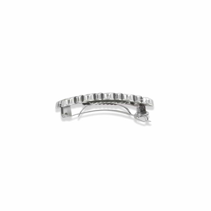 Brighton hair barrette shown from the back with silver-plated ridged bar and hinged clasp mechanism on a white background