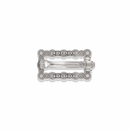 Brighton rectangular hair barrette with silver-plated scrollwork and beaded border design shown from the back on a white background