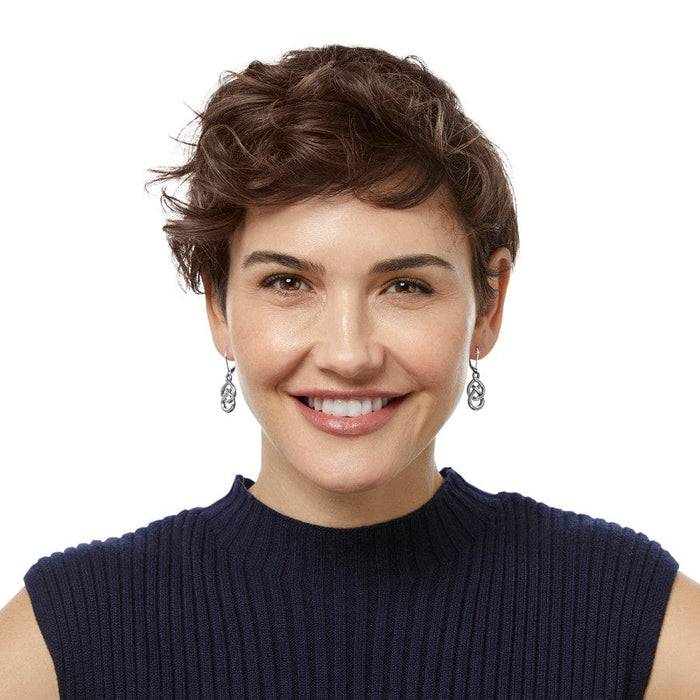 Model in navy top wearing Interlok Braid Petite Leverback Earrings