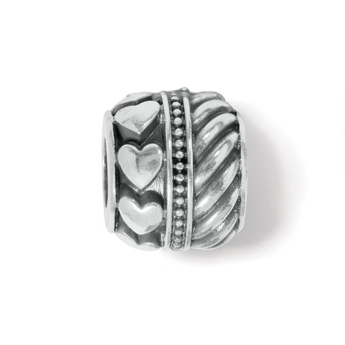 Brighton silver-plated bead charm with raised heart motifs, beaded trim, and twisted rope pattern on a white background