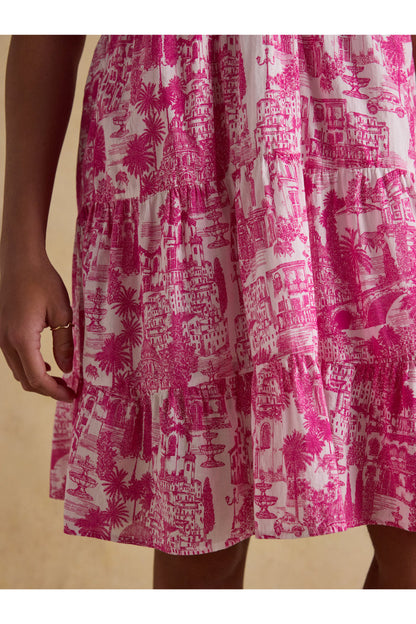 Close-up of pink toile print and tiered fabric detail on the Joules H63479 Ariella Pink Toile Tiered Dress by Joules. Shop Joules at Dotique.