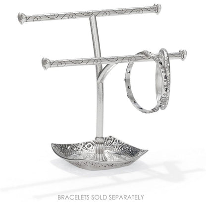 Brighton silver-plated two-tier bracelet stand with scroll-engraved bars, decorative tray base, and one bangle on a white background