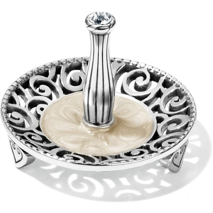Brighton ring holder with silver-tone scrollwork, cream enamel dish, and crystal-topped center post on a white background