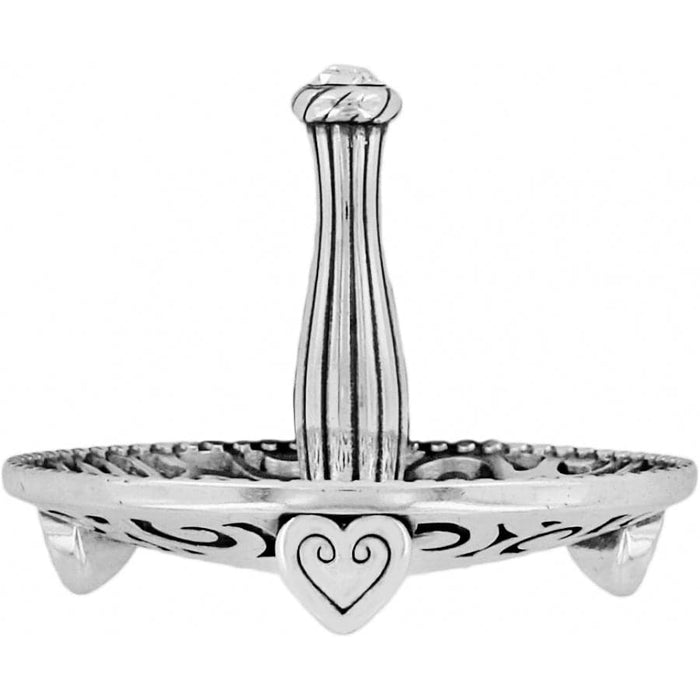 Brighton ring holder with silver-tone heart accent, scrollwork base, and central fluted post on a white background