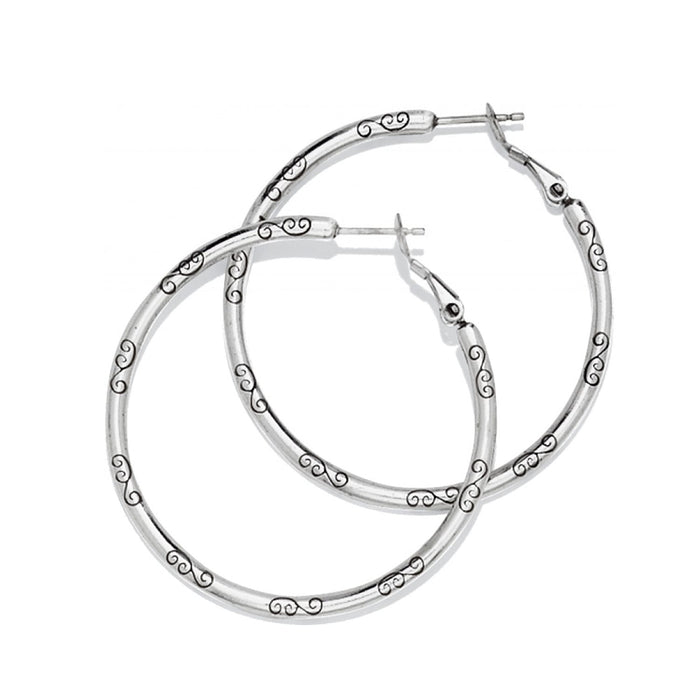 Brighton hoop earrings in silver-tone finish with engraved scroll detailing along the bands on a white background