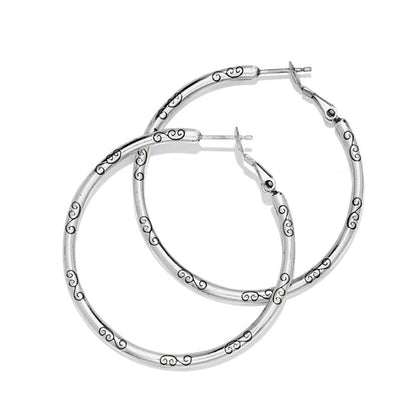 Brighton hoop earrings in silver-tone finish with engraved scroll detailing along the bands on a white background