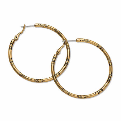 Brighton gold-plated hoop earrings with engraved scroll detail along the band on a white background