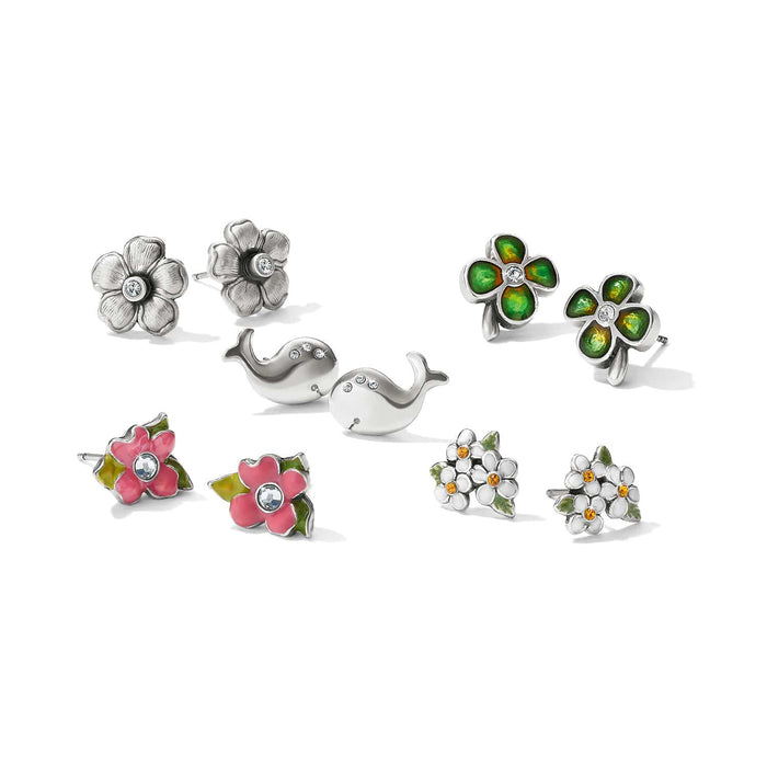 Brighton stud earrings set with silver-plated flowers, whales, and enamel clovers featuring crystal accents on a white background