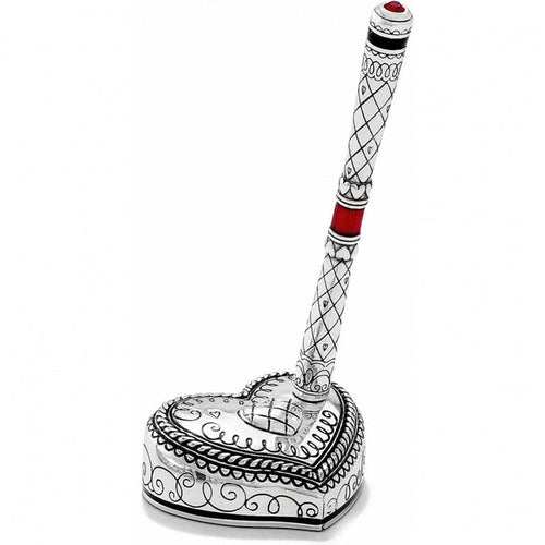 Brighton silver-plated pen with heart-shaped base, lattice engraving, red crystal accent, and red enamel band on a white background