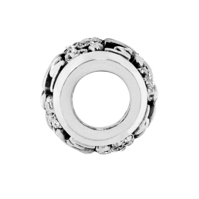 Brighton silver-plated spacer charm with textured floral pattern and crystal accents around open center on a white background