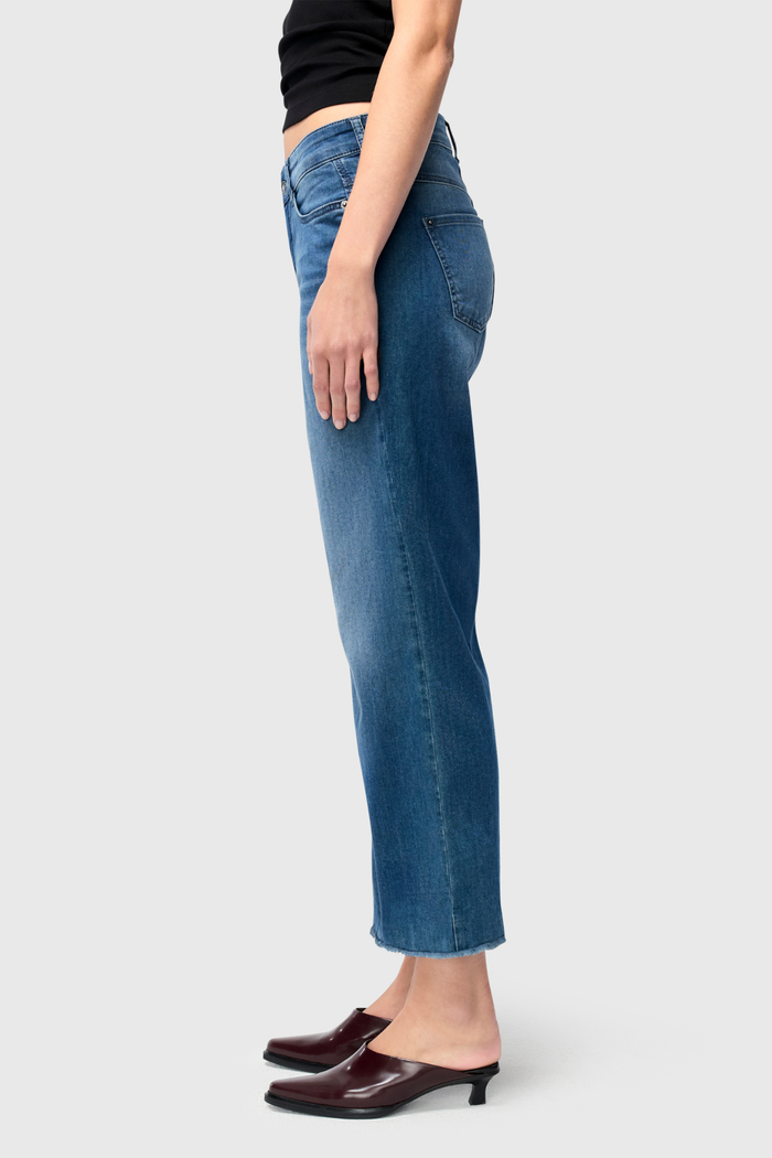 Designed for effortless style and comfort, the Dotique MAC Dream Wide Cropped Jeans in Storm Blue Wash offer a modern, relaxed silhouette. Shop MAC Jeans at Dotique.