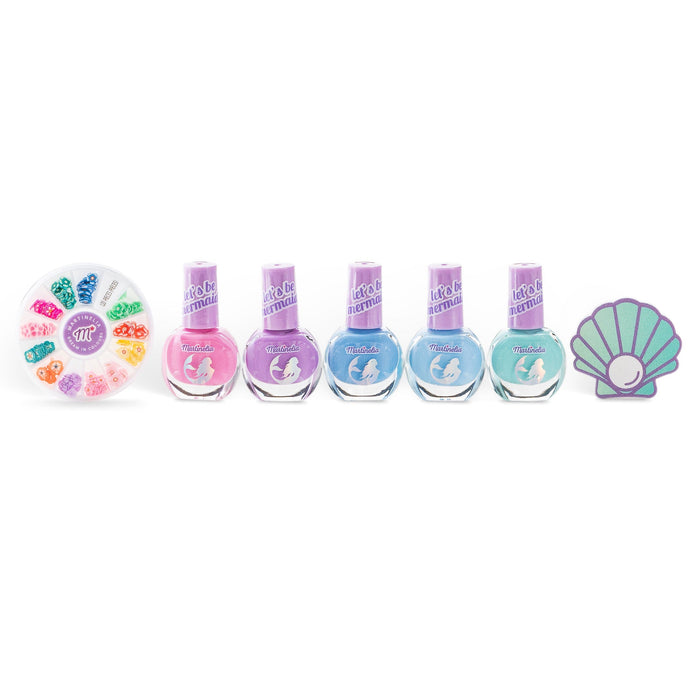 The Martinelia Let's Be Mermaids Nails Design Kit by Martinelia features five pastel polishes, a round box of nail decorations, and a seashell-shaped buffer—a whimsical set for playful kids displayed on a white background.