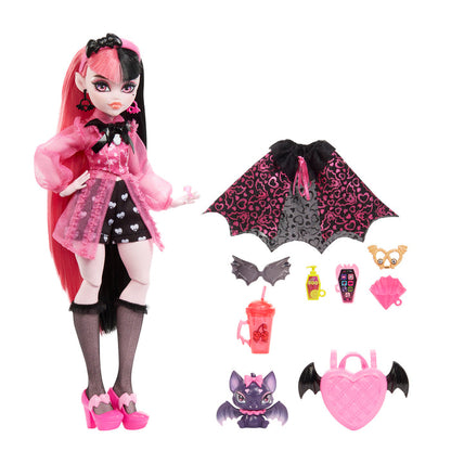 The Mattel Monster High Draculaura Doll features long pink and black hair, a chic vampire outfit, and comes with a bat-shaped cape, sunglasses, drinks, pet bat, and a pink heart-shaped backpack.