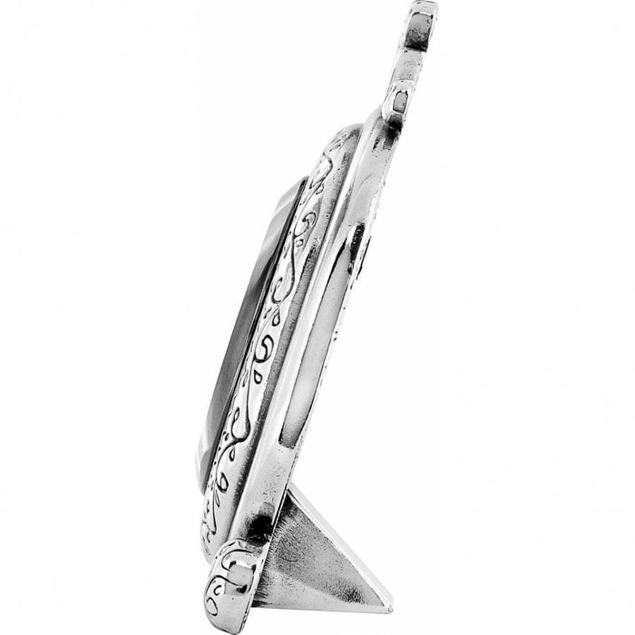 Brighton frame shown from the side with silver-plated scroll detailing and easel stand on a white background