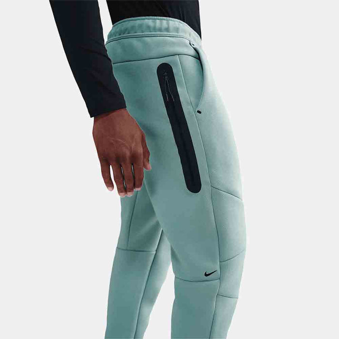 Side view of the Men's Nike Tech Fleece Joggers.