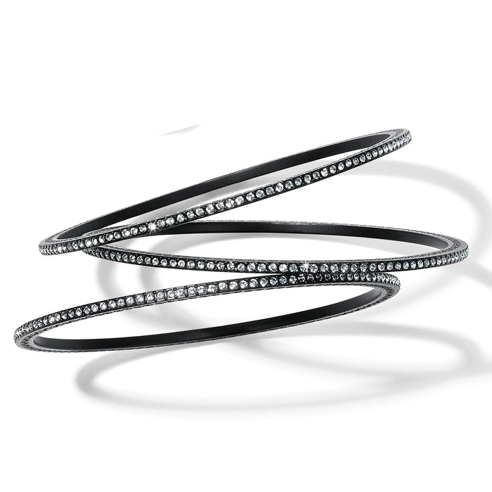 Brighton bangle bracelets with black lacquer finish and pavé crystal detailing, three stacked together on a white background