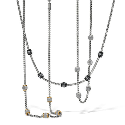 Brighton layered chain necklaces with silver-plated, gold-plated, and black lacquer crystal beaded stations on a white background