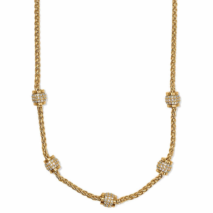 Brighton necklace with gold-plated wheat chain and five crystal-encrusted barrel stations on a white background