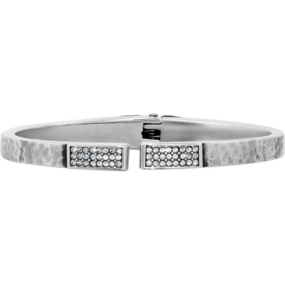 Brighton hinged bangle bracelet with hammered silver-tone finish and pavé crystal end caps on a white background