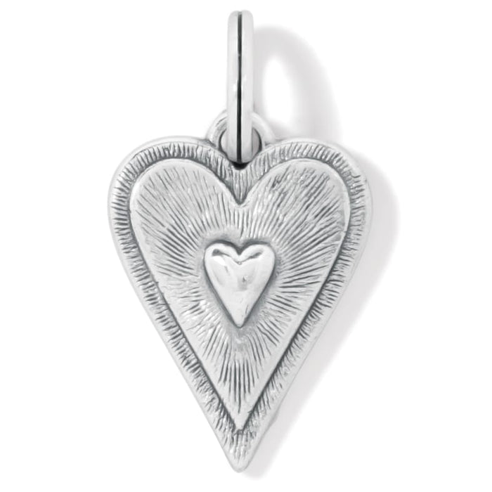 Brighton heart charm with silver-plated finish, radiating textured rays and raised center heart on a white background