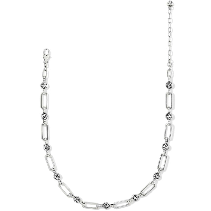 Brighton silver-plated chain necklace with elongated links and round scroll-patterned bead stations on a white background