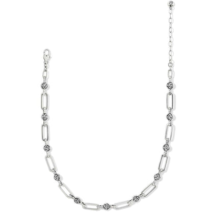 Brighton silver-plated chain necklace with elongated links and round scroll-patterned bead stations on a white background