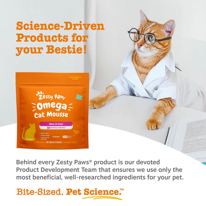 Orange Zesty Paws Omega Cat Mousse pouch with skin and coat formula next to an orange tabby cat wearing glasses and white coa