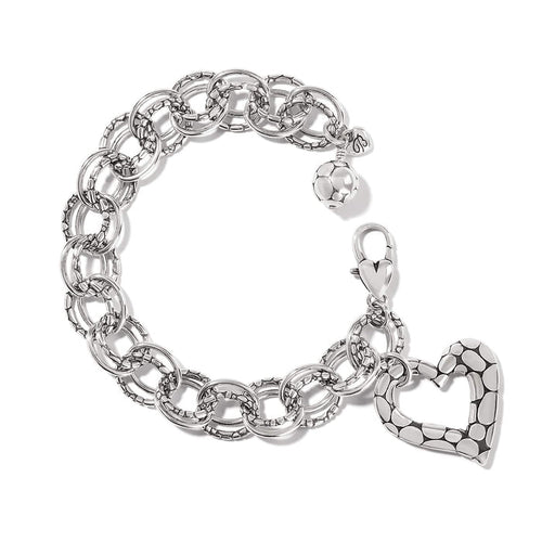 Brighton charm bracelet with silver-plated linked rings, dotted heart charm, and beaded ball accent on a white background