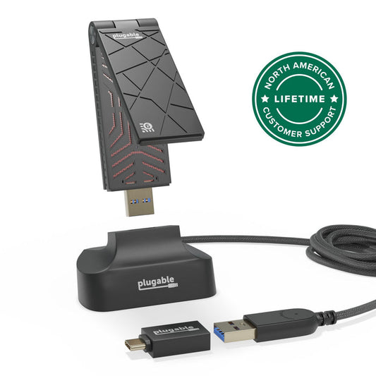Plugable WiFi 6 USB adapter with USB-A to USB-C adapter, USB 3.0 cable, and North American lifetime customer support.