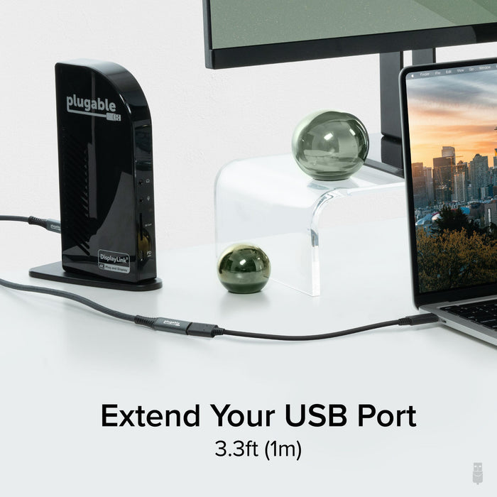 Plugable USBC-METER3-1MF USB-C extension cable, 3.3ft (1m) length, connecting a laptop to a DisplayLink docking station.