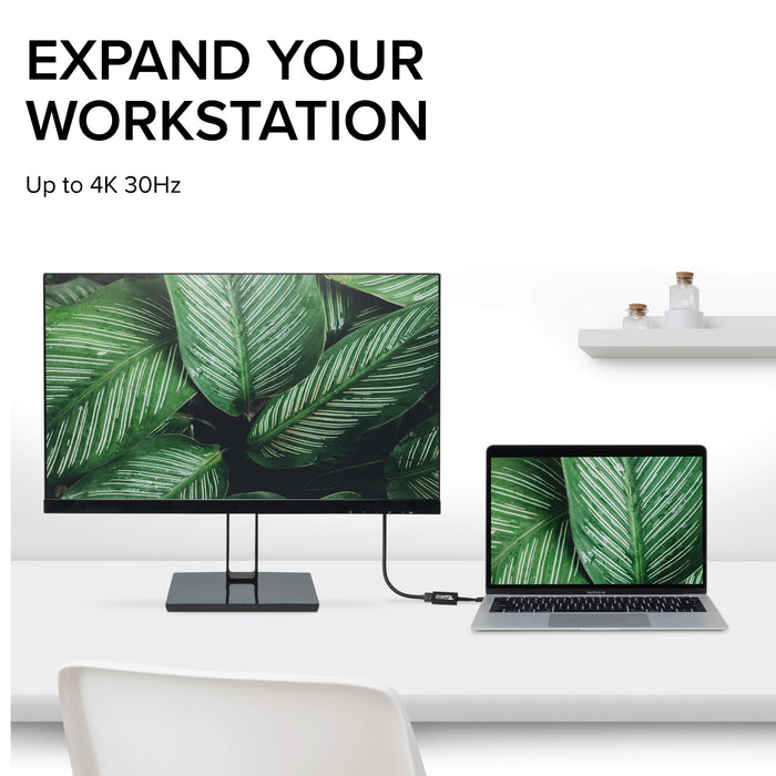 Plugable USB-C to HDMI adapter connecting a laptop to an external monitor, supporting resolutions up to 4K 30Hz.