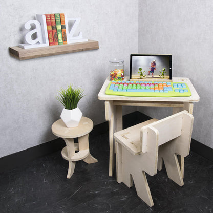 Plugable USB-EZK-G kids keyboard with color-coded, extra-large keys on a wooden desk with a tablet.