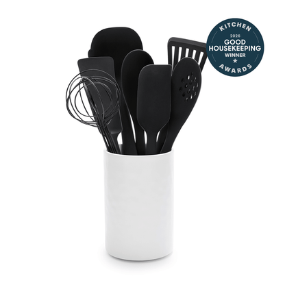 White crock with 8 black silicone kitchen utensils and a “2026 Good Housekeeping Kitchen Awards” badge visible.