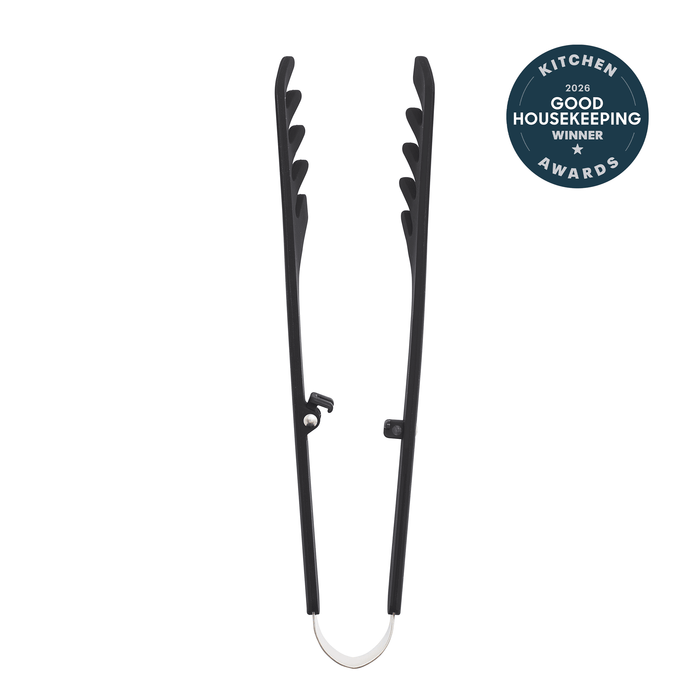 Premiere Silicone Locking Pasta Tongs in black, featuring ridged anti-slip grip tips, are shown open on a white background. A circular badge at the top right reads "Kitchen 2024 Good Housekeeping Awards Winner.