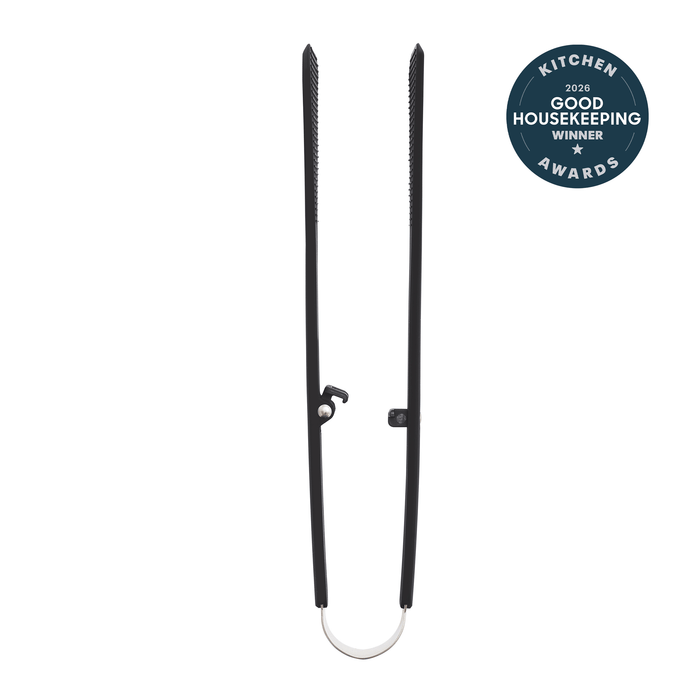 Premiere Silicone Wide Tongs | Black, featuring a rounded handle and locking mechanism, are shown vertically on a white background with a 2024 Good Housekeeping Kitchen Awards Winner badge. Ideal heat-resistant kitchen tongs.