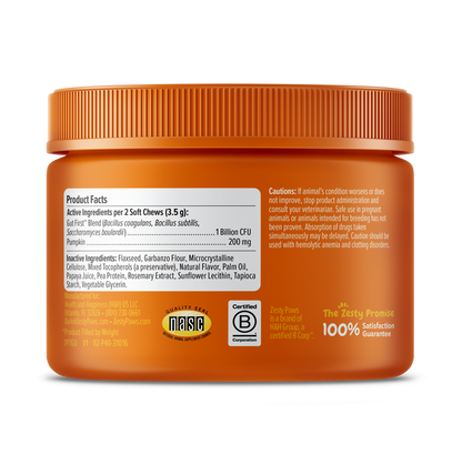 Orange plastic jar with orange ribbed cap containing puppy probiotic soft chews, labeled with product facts and ingredients.